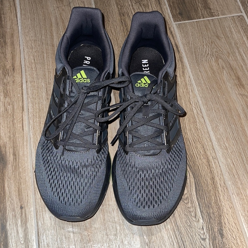 Mens size 13 Adidas athletic sneakers.
